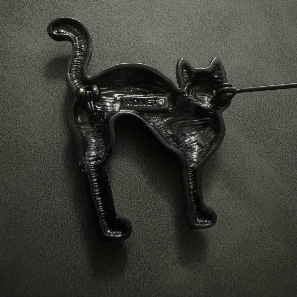 Monet Black Crystal Cat Pin with Emerald Green Eyes
